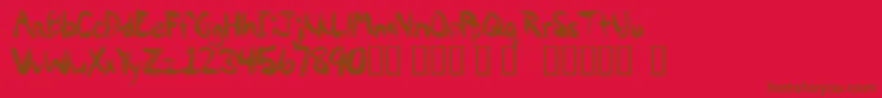 Fonte Paintypaint1 – fontes marrons em um fundo vermelho