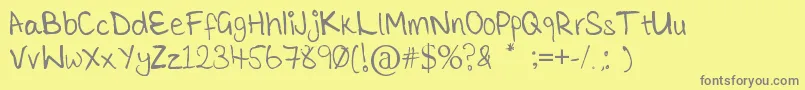 Więcej informacji o czcionce TickleMeElmo Czcionka TickleMeElmo – szare czcionki na żółtym tle