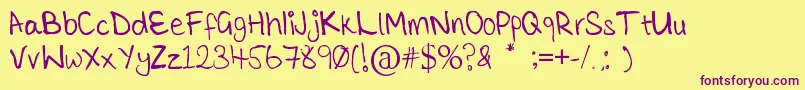 TickleMeElmo Font – Purple Fonts on Yellow Background
