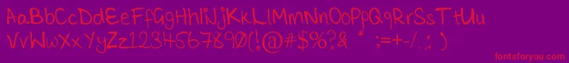 TickleMeElmo-Schriftart – Rote Schriften auf violettem Hintergrund