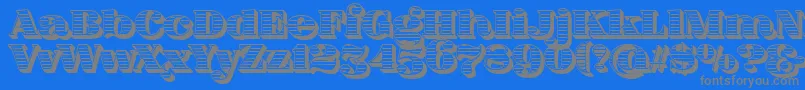 FatFlamingo5Woodcut-Schriftart – Graue Schriften auf blauem Hintergrund