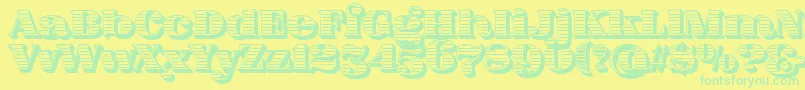 FatFlamingo5Woodcut Font – Green Fonts on Yellow Background