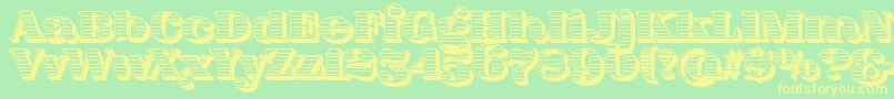 FatFlamingo5Woodcut Font – Yellow Fonts on Green Background