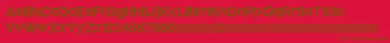 フォントCitystencil – 赤い背景に茶色の文字