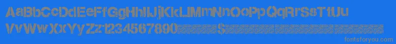 フォントCitystencil – 青い背景に灰色の文字
