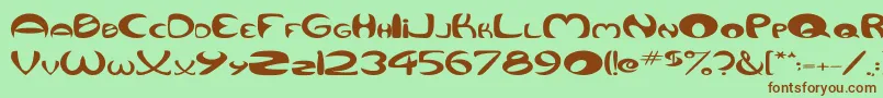 QurveWide Font – Brown Fonts on Green Background