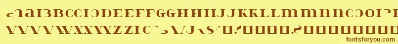 フォントKonstatastencil – 茶色の文字が黄色の背景にあります。