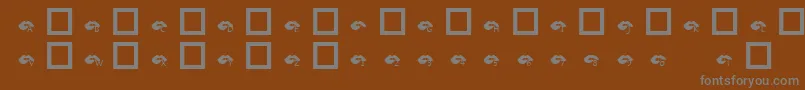 Шрифт KrBiteYourLip – серые шрифты на коричневом фоне