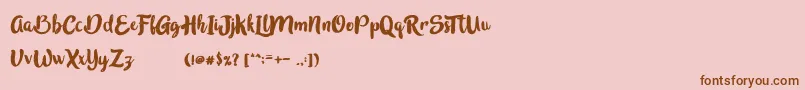 InBlossomVintage-Schriftart – Braune Schriften auf rosa Hintergrund