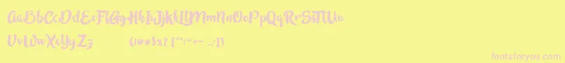 Czcionka InBlossomVintage – różowe czcionki na żółtym tle