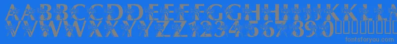 フォントLmsByThePowerOfGrayskull – 青い背景に灰色の文字