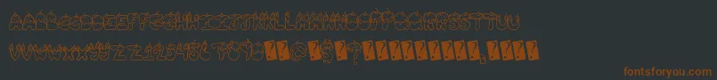 Tastysundae Font – Brown Fonts on Black Background
