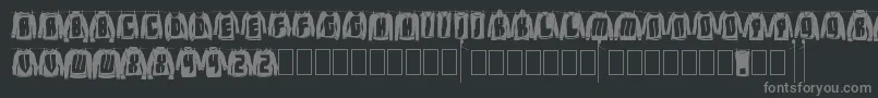 フォントLaundryDay – 黒い背景に灰色の文字