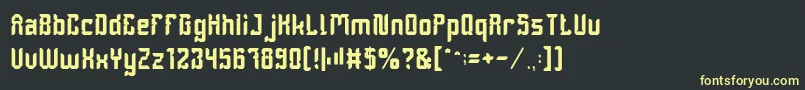 フォントDayakShield – 黒い背景に黄色の文字