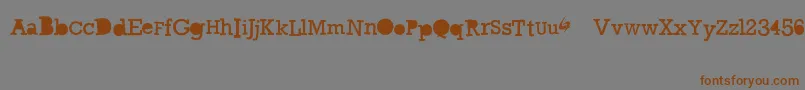 GycentiumGoespop Font – Brown Fonts on Gray Background