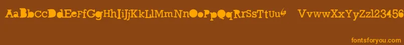 GycentiumGoespop Font – Orange Fonts on Brown Background