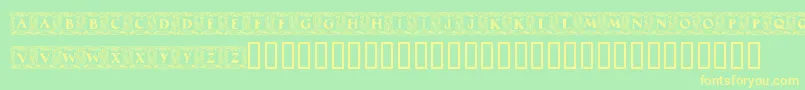 MaximilianAntiquaInitialen-fontti – keltaiset fontit vihreällä taustalla