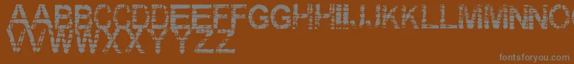 Eraser Font – Gray Fonts on Brown Background