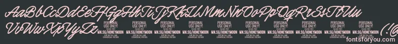 HoneymoonboldPersonal-Schriftart – Rosa Schriften auf schwarzem Hintergrund