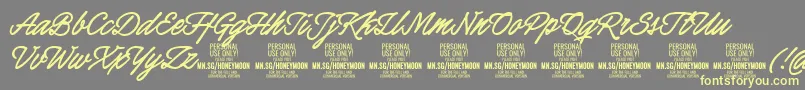 HoneymoonboldPersonal Font – Yellow Fonts on Gray Background