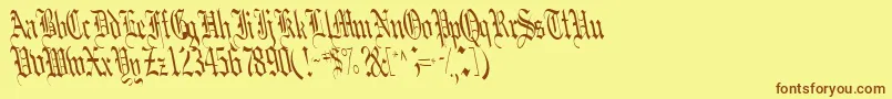 フォントBoobRegular – 茶色の文字が黄色の背景にあります。