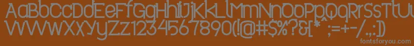 Revo ffy-fontti – harmaat kirjasimet ruskealla taustalla
