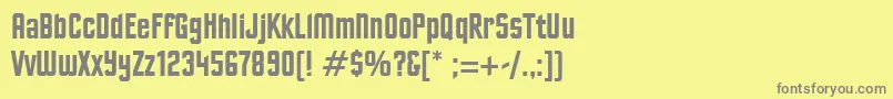 フォントExcelsiorsans – 黄色の背景に灰色の文字