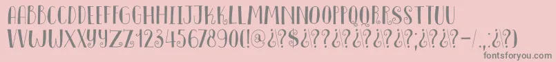 DkInnuendo-Schriftart – Graue Schriften auf rosa Hintergrund