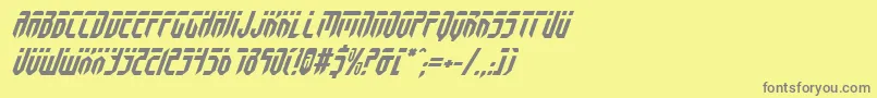 FedyralItalic-fontti – harmaat kirjasimet keltaisella taustalla