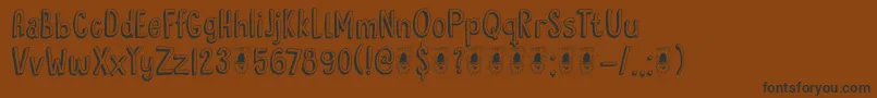 DkHyggelig Font – Black Fonts on Brown Background