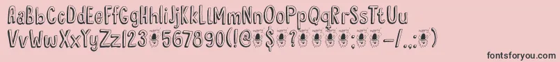 フォントDkHyggelig – ピンクの背景に黒い文字