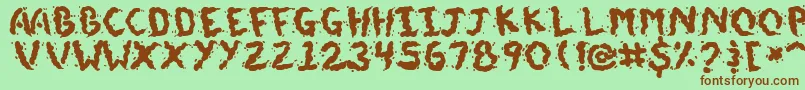 DoggieDoodie Font – Brown Fonts on Green Background