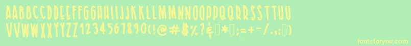 LetsgauxRegular Font – Yellow Fonts on Green Background