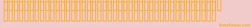 フォントUzrelief – オレンジの文字がピンクの背景にあります。