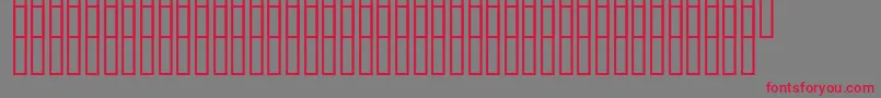 フォントUzrelief – 赤い文字の灰色の背景