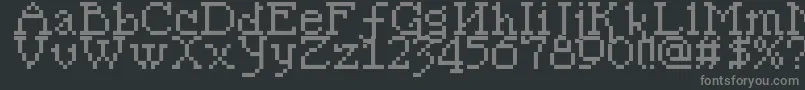 Pixelsleigh-fontti – harmaat kirjasimet mustalla taustalla