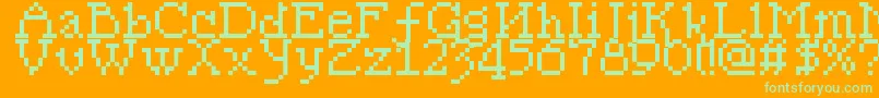Pixelsleigh-Schriftart – Grüne Schriften auf orangefarbenem Hintergrund