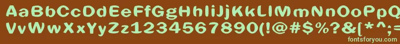 フォントSpheric – 緑色の文字が茶色の背景にあります。