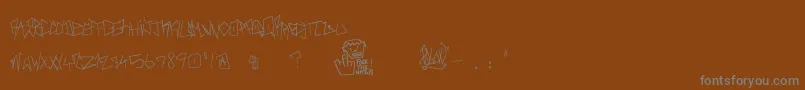 RealBreakerz Font – Gray Fonts on Brown Background