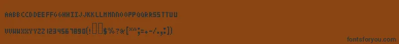 Pixeltext Font – Black Fonts on Brown Background