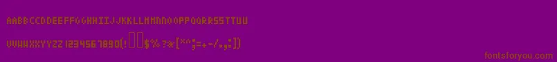 Czcionka Pixeltext – brązowe czcionki na fioletowym tle