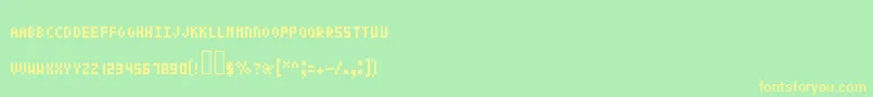 Czcionka Pixeltext – żółte czcionki na zielonym tle