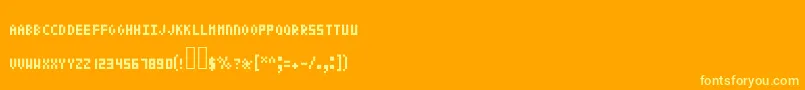 Czcionka Pixeltext – żółte czcionki na pomarańczowym tle
