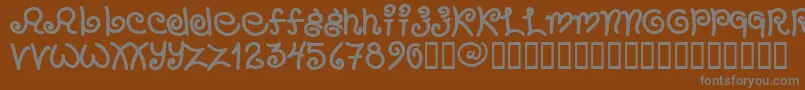 フォントChang – 茶色の背景に灰色の文字