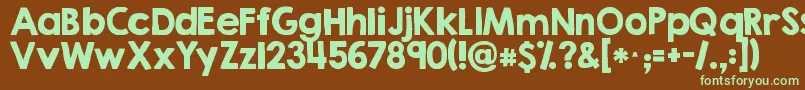 フォントKgsecondchancessolid – 緑色の文字が茶色の背景にあります。