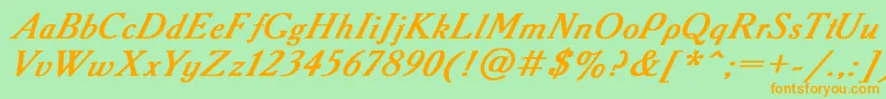 フォントAcademy2 – オレンジの文字が緑の背景にあります。