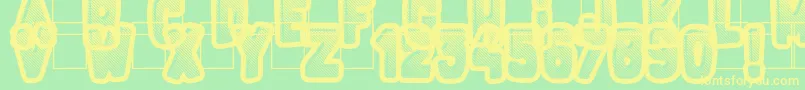 フォントFluoGums – 黄色の文字が緑の背景にあります