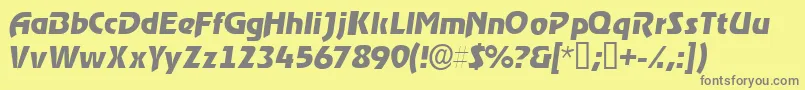 ThimbasskItalic-fontti – harmaat kirjasimet keltaisella taustalla
