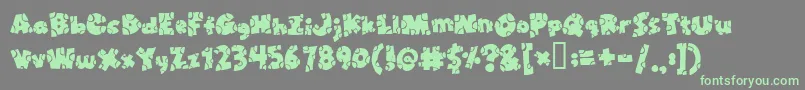 Broken Toys Font – Green Fonts on Gray Background