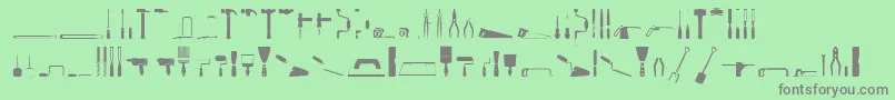 ToolsRegular Font – Gray Fonts on Green Background